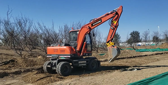 Wheel excavator working in the forest
